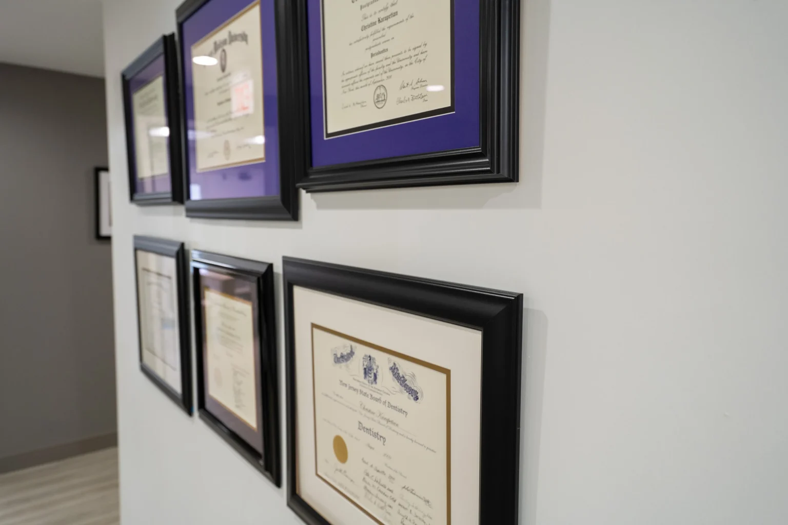 Dental Office Wall Displaying Professional Certifications