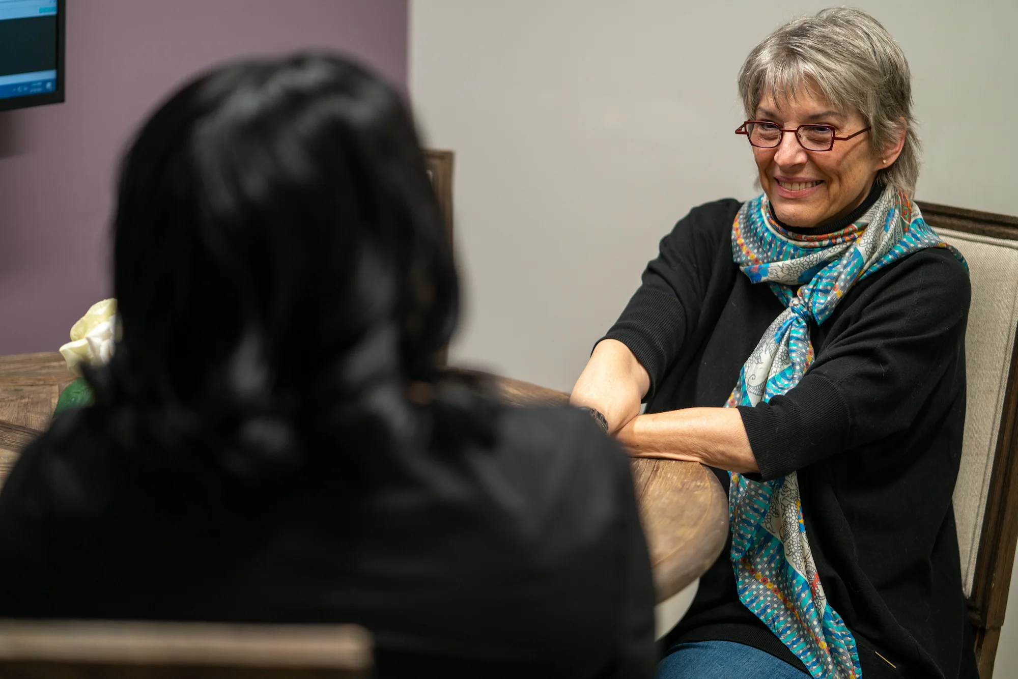 Periodontist Discussing Treatment Options With Patient During Consultation